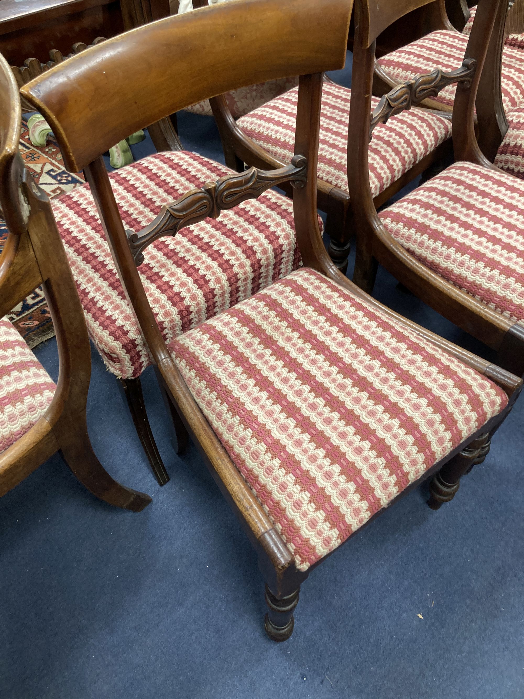 A harlequin set of nine George IV mahogany dining chairs (one having arms)